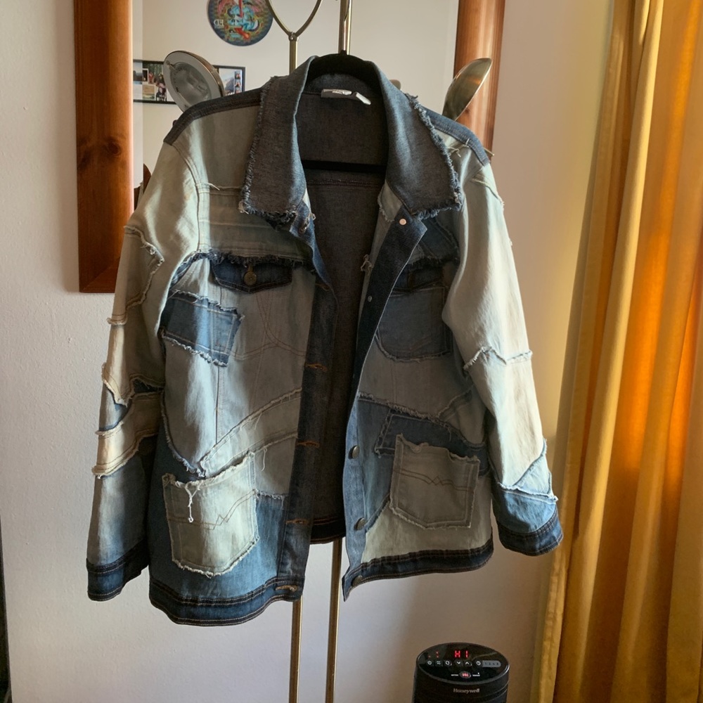 Incredibly unique vintage oversized denim jacket.